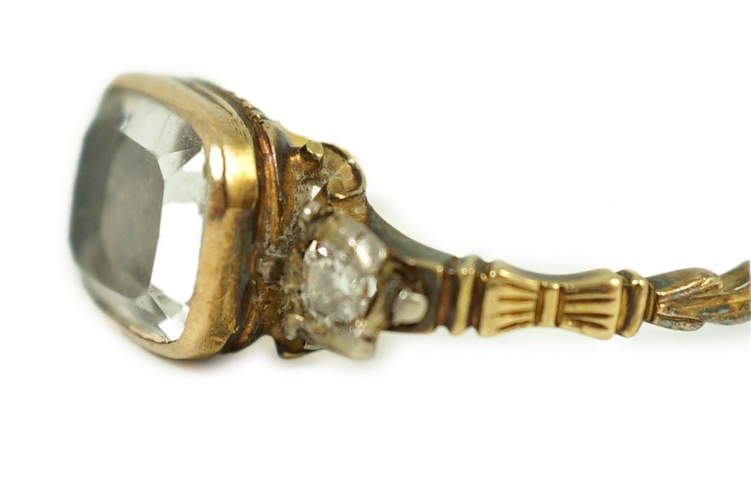 An 18th century gold and rock crystal and diamond set mourning ring